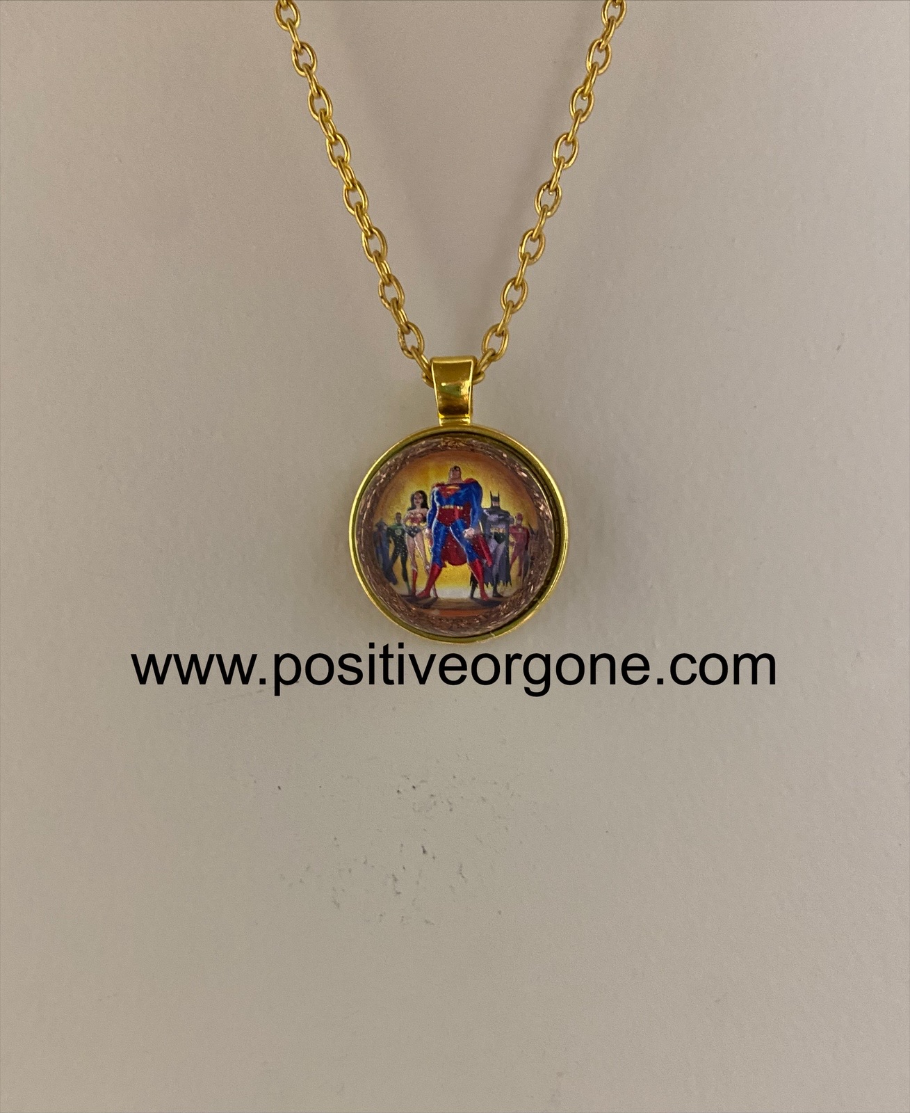 Handmade orgone pendant with crystal and metal layers